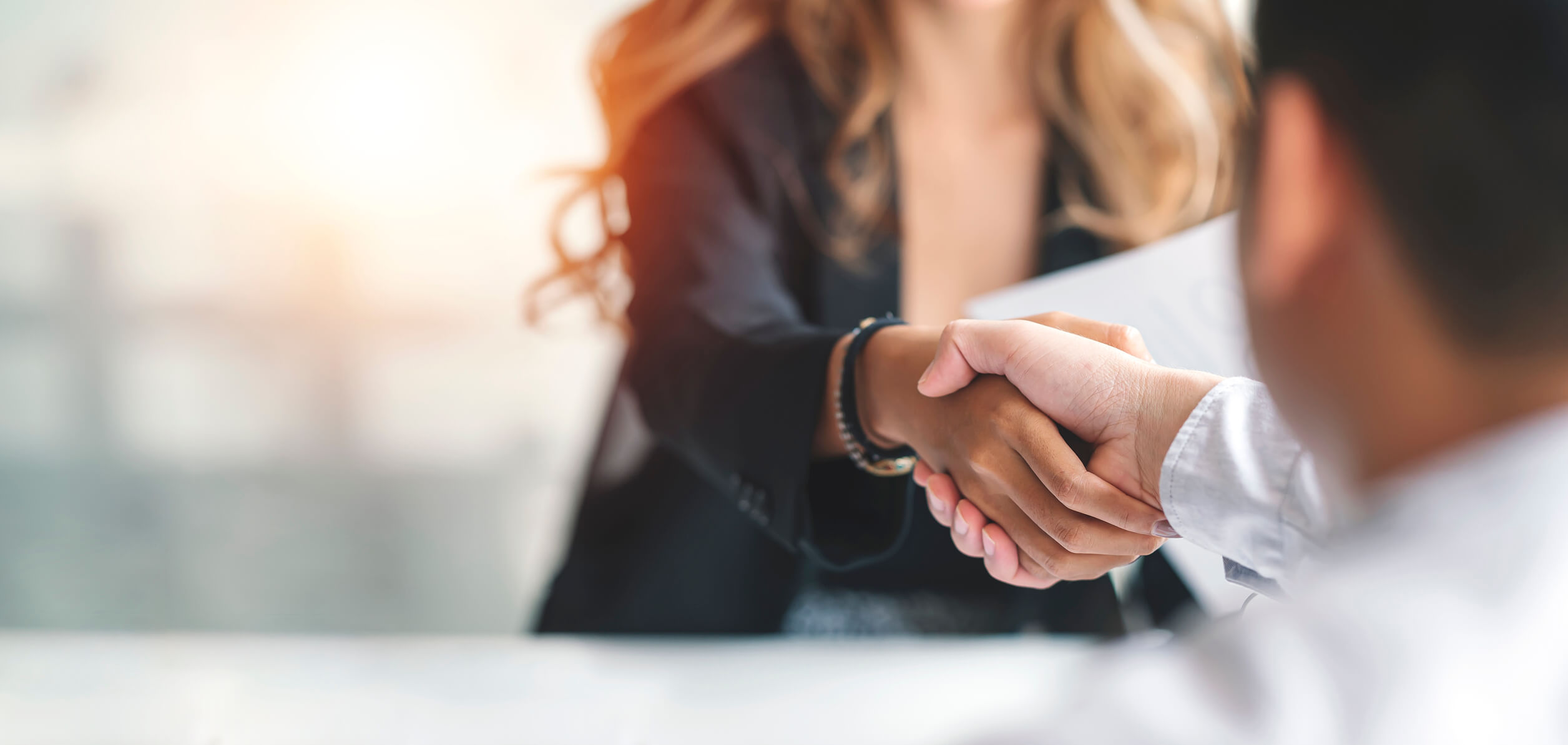 shaking hands at an interview